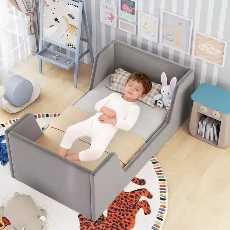 Letto per bambini a pavimento imbottito in morbido tessuto vellutato con spondine di sicurezza e testiera grigio/rosa