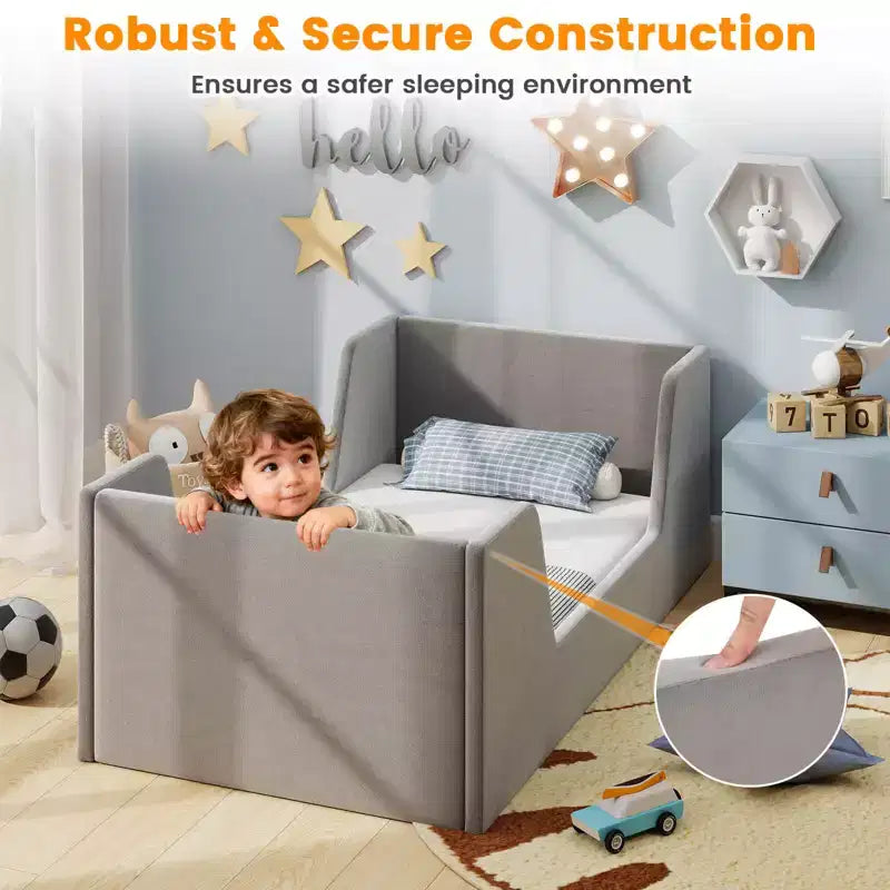 Letto per bambini a pavimento imbottito in morbido tessuto vellutato con spondine di sicurezza e testiera grigio/rosa